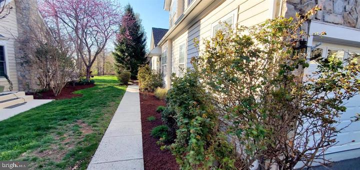 20153 Valhalla Square Ashburn, VA 20147 - Photo 23 of 26 a view of a pathway with a building