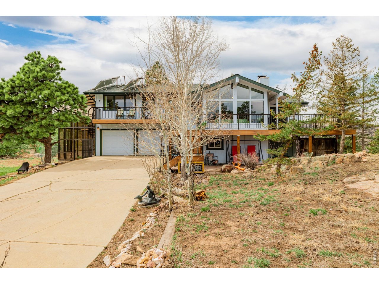 37 High View Lane Boulder, CO 80302 - Photo 5 of 50 a front view of house with yard