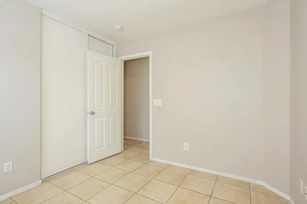 a bathroom with a sink toilet vanity and shower
