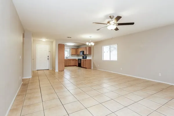 a view of an empty room and window