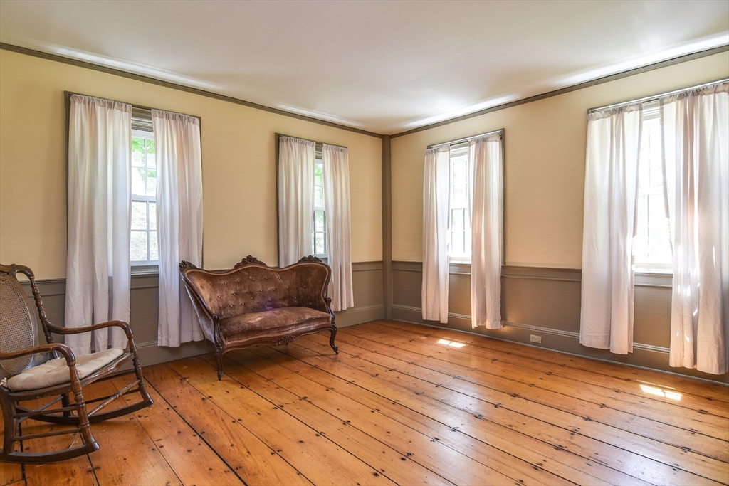 33 Grove Street Framingham, MA 01701 - Photo 3 of 33 a living room with furniture and wooden floor