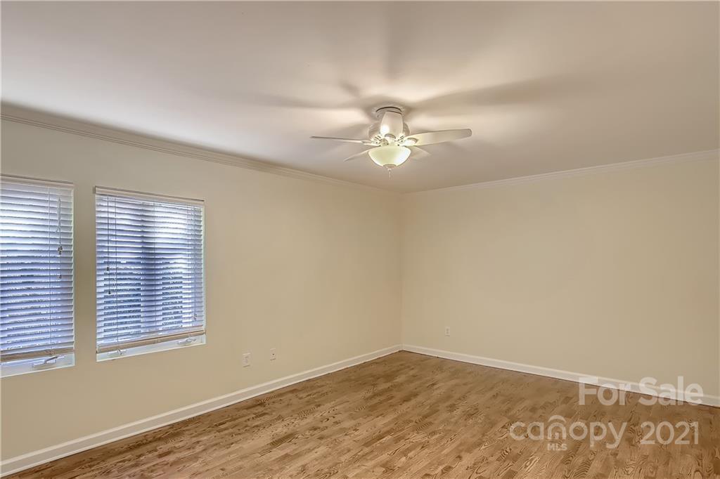7040 Quail Hill Road Charlotte, NC 28210 - Photo 14 of 33 an empty room with a window
