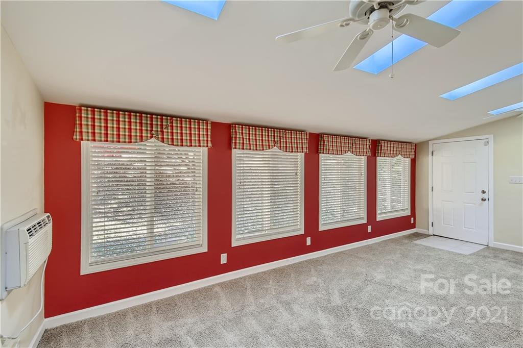 7040 Quail Hill Road Charlotte, NC 28210 - Photo 27 of 33 a view of an empty room with a window