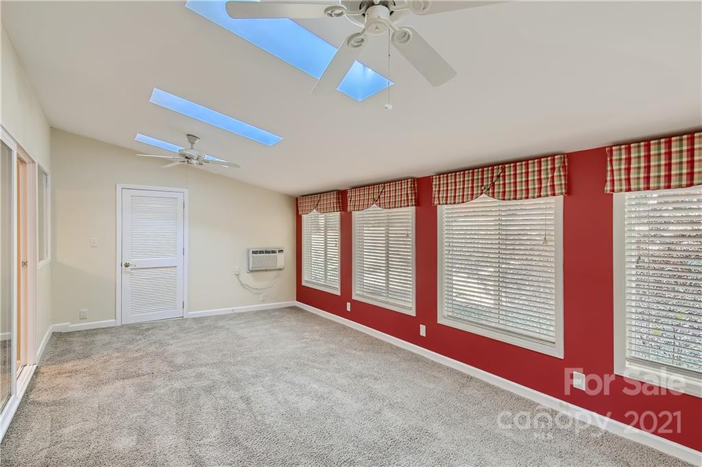 7040 Quail Hill Road Charlotte, NC 28210 - Photo 29 of 33 a view of an empty room with a window