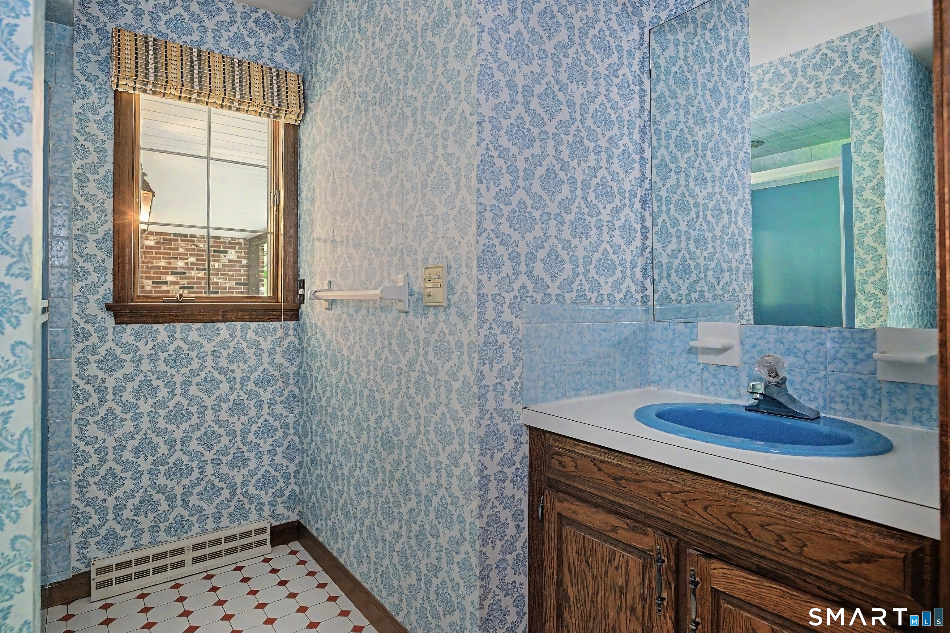 370 Hubbard Road Haddam, CT 06441 - Photo 28 of 39 Hall bathroom shared by two bedrooms.