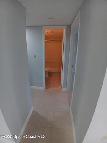 en empty room with windows