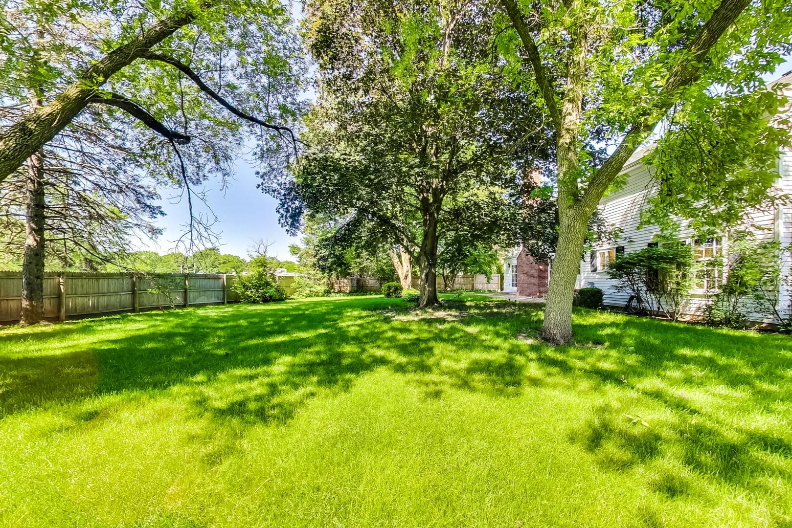 2441 Shannon Road Northbrook, IL 60062 - Photo 21 of 26 a view of a trees with a yard