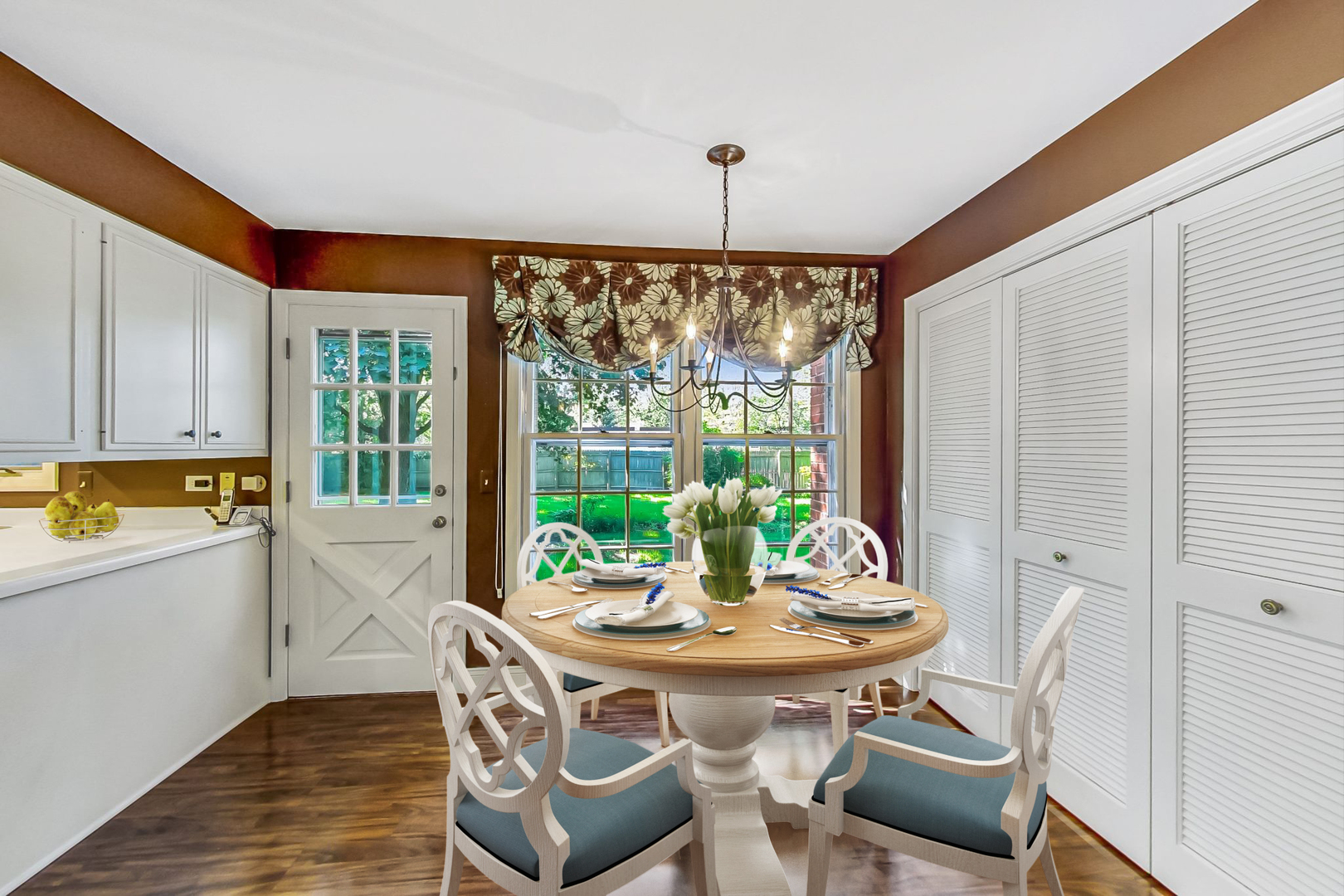2441 Shannon Road Northbrook, IL 60062 - Photo 9 of 26 a view of a dining room with furniture window and outside view