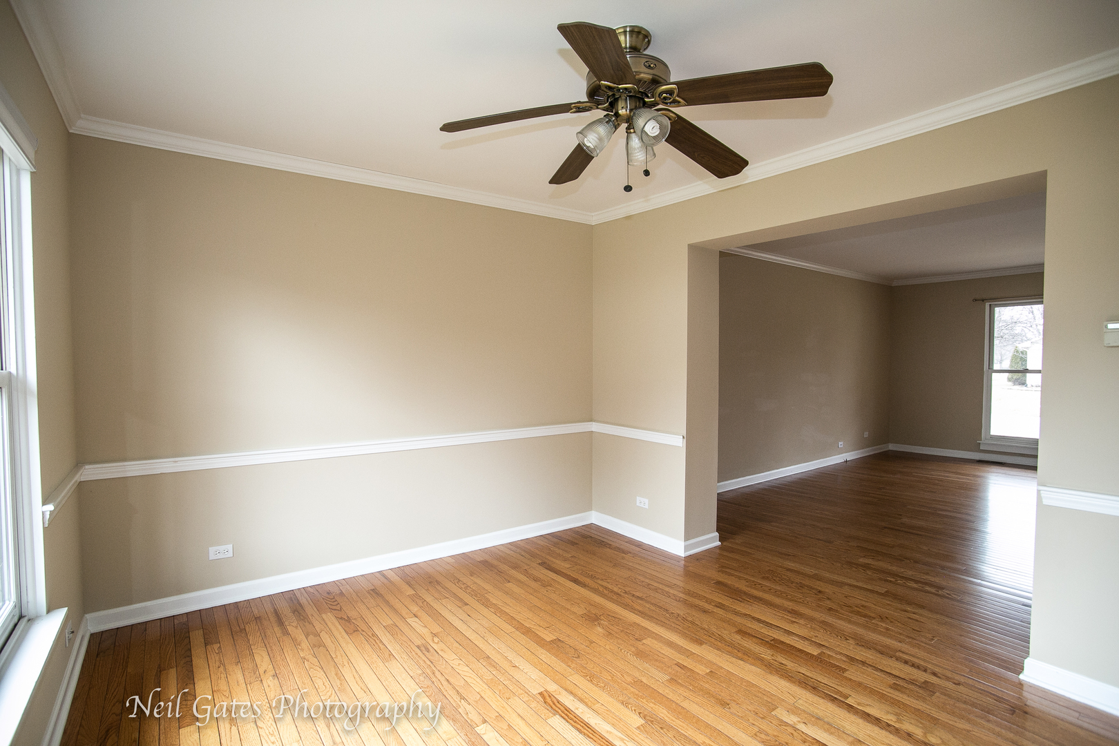 586 Roxbury Drive Naperville, IL 60565 - Photo 14 of 39 a view of empty room with wooden floor