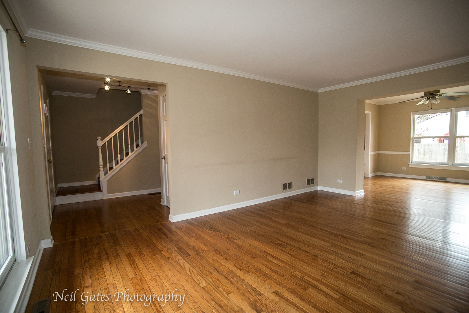 586 Roxbury Drive Naperville, IL 60565 - Photo 3 of 39 wooden floor in an empty room with a window