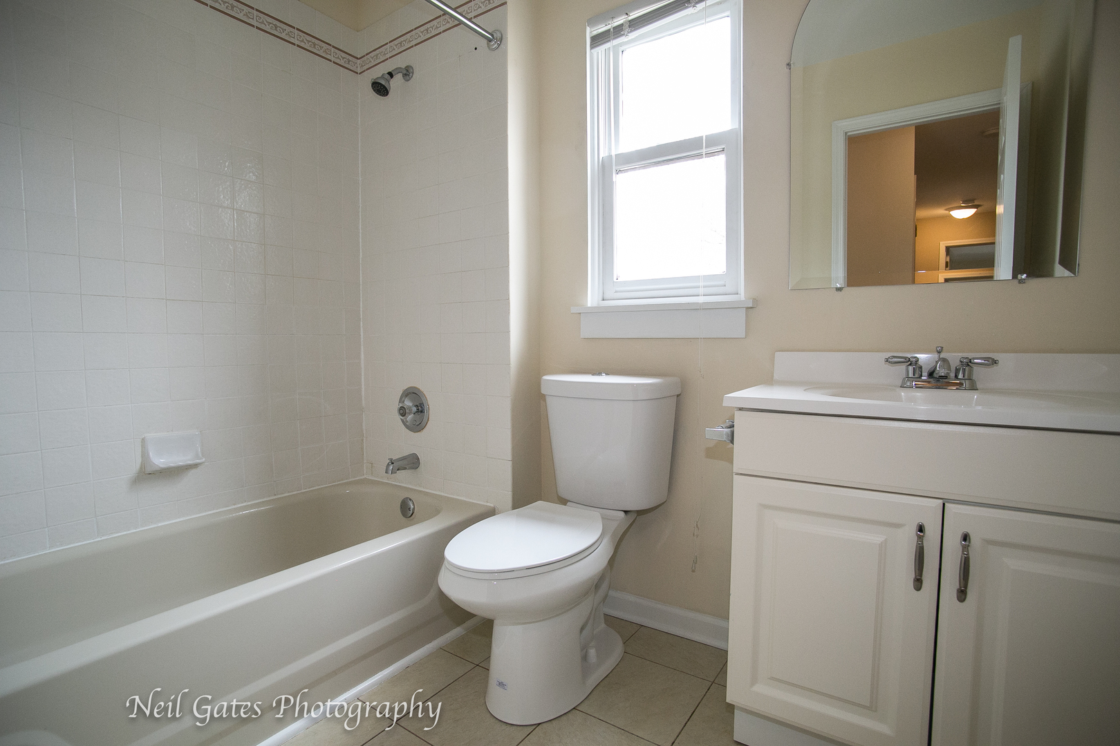 586 Roxbury Drive Naperville, IL 60565 - Photo 24 of 39 a bathroom with a sink toilet and shower