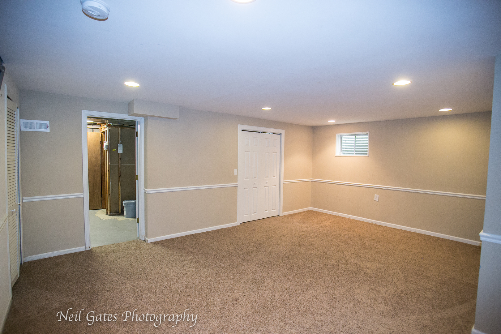 586 Roxbury Drive Naperville, IL 60565 - Photo 30 of 39 an empty room with a empty space and windows