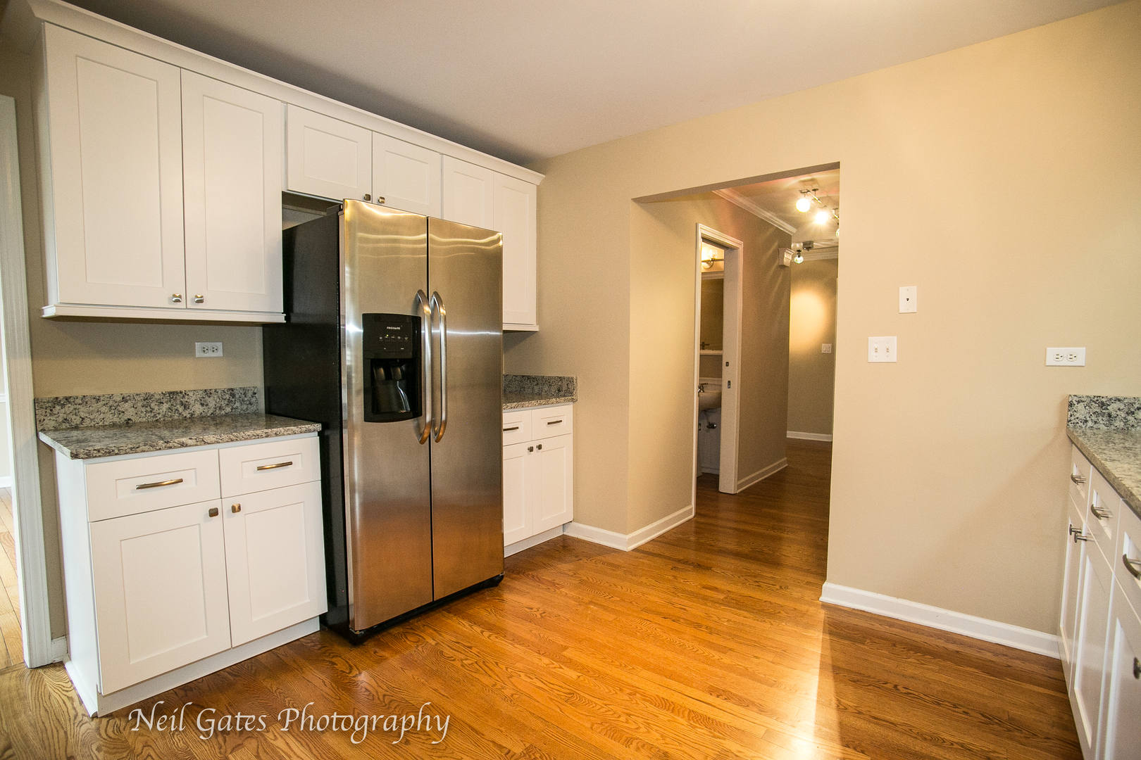 586 Roxbury Drive Naperville, IL 60565 - Photo 9 of 39 a kitchen with stainless steel appliances granite countertop a refrigerator and a stove