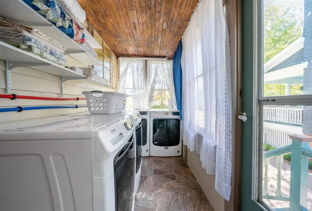 a view of an entryway and workspace