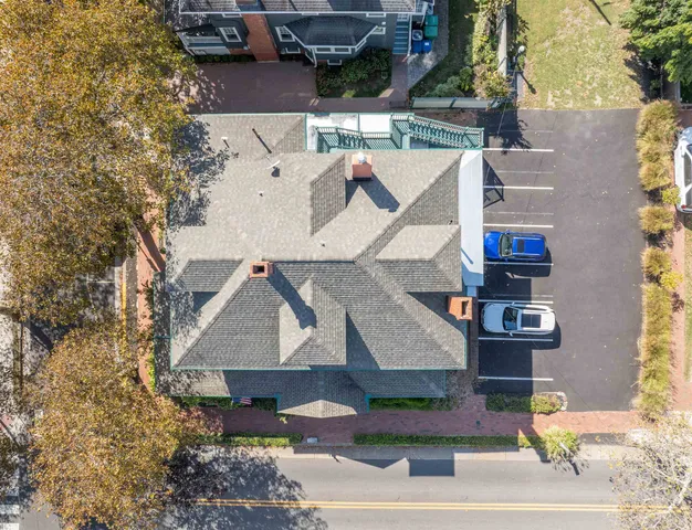 an aerial view of houses with outdoor space