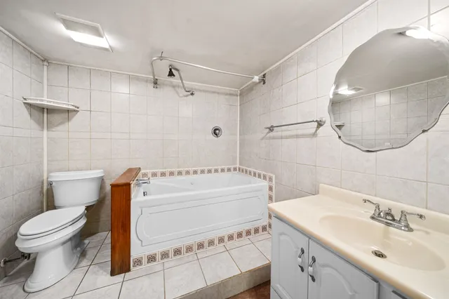 a bedroom with a bed and a closet