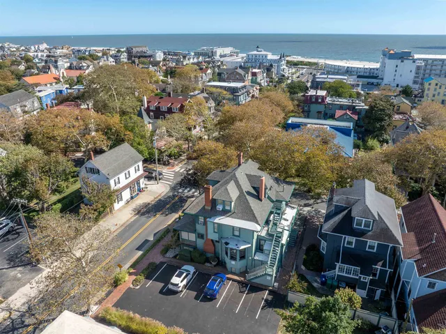 an aerial view of a house with a outdoor space