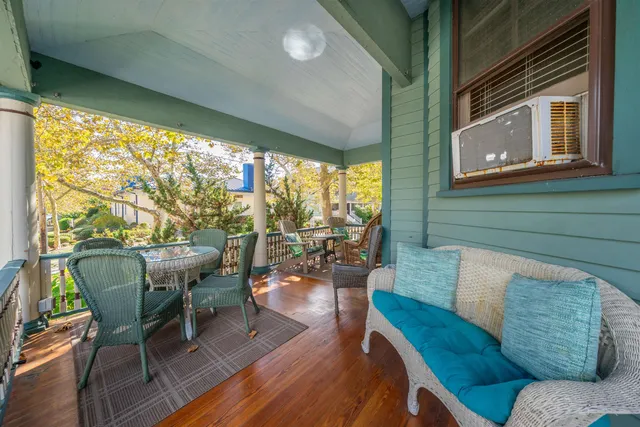 a bedroom with a bed and a desk