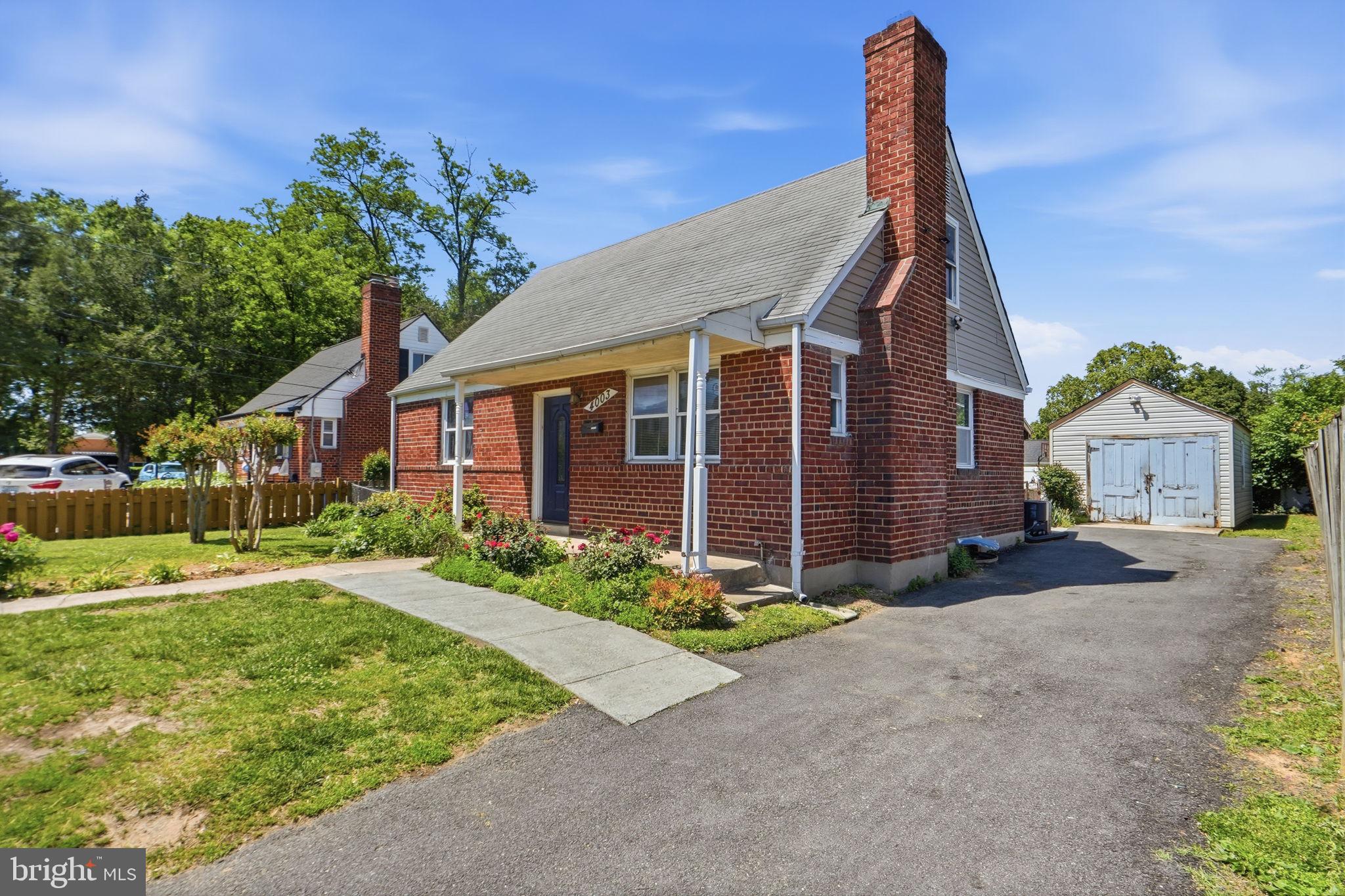 4003 Randolph Road Silver Spring, MD 20902 - Photo 3 of 30 Charming brick home with lush gardens.