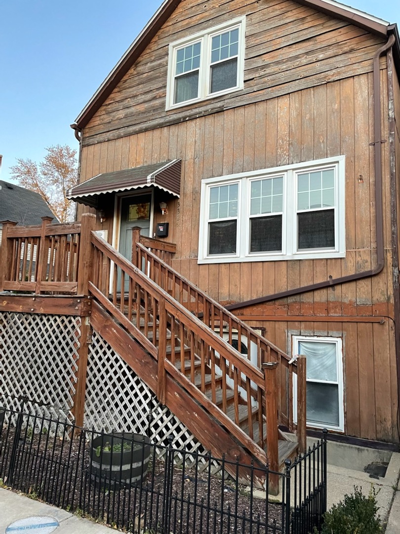 a front view of a house with a balcony