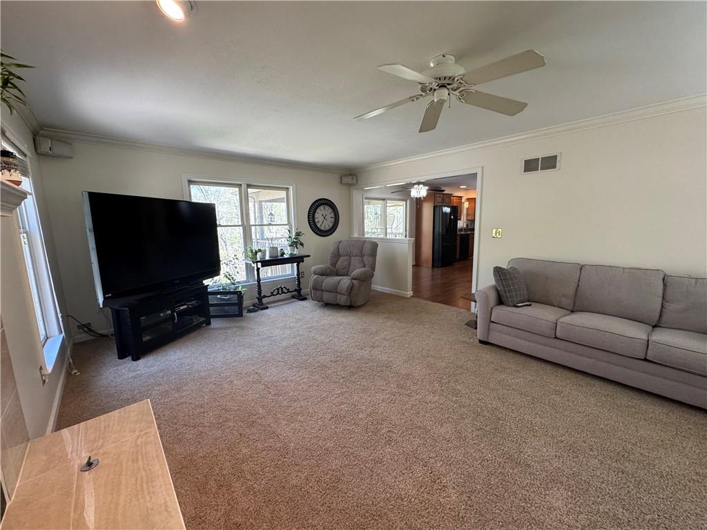 207 Oak Leaf Drive Mars, PA 16046 - Photo 13 of 40 a living room with furniture and a flat screen tv