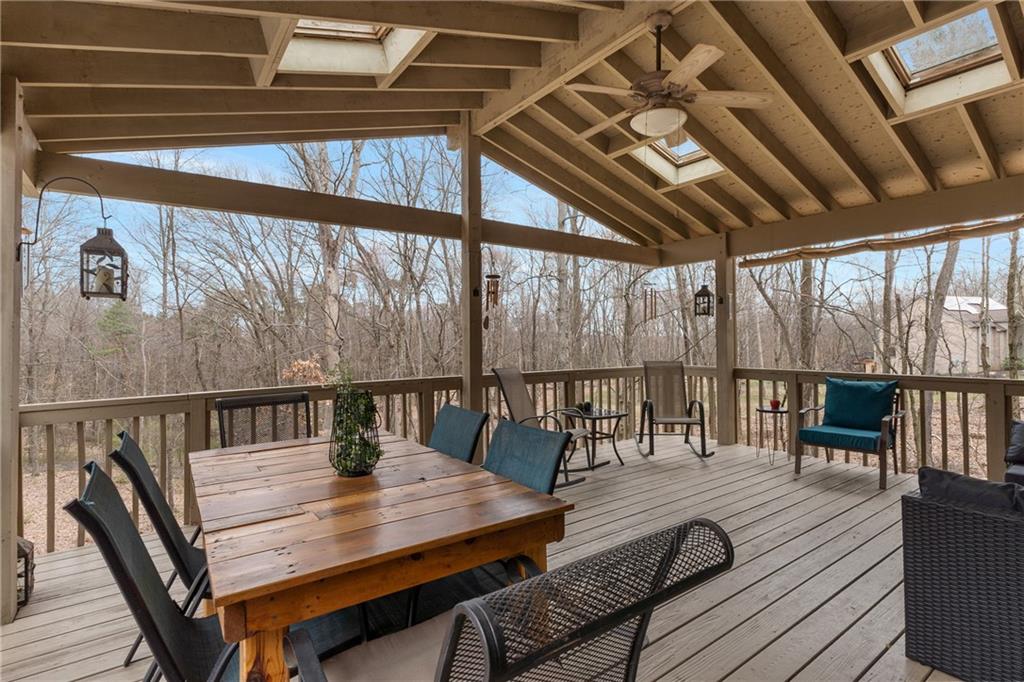 207 Oak Leaf Drive Mars, PA 16046 - Photo 16 of 40 a view of a balcony with chairs and wooden floor