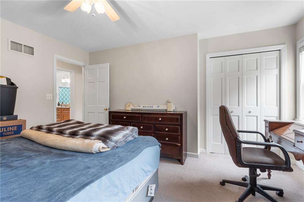 207 Oak Leaf Drive Mars, PA 16046 - Photo 24 of 40 a bedroom with a bed and a window