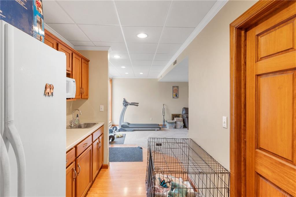 207 Oak Leaf Drive Mars, PA 16046 - Photo 32 of 40 a spacious bathroom with a granite countertop sink and a tub