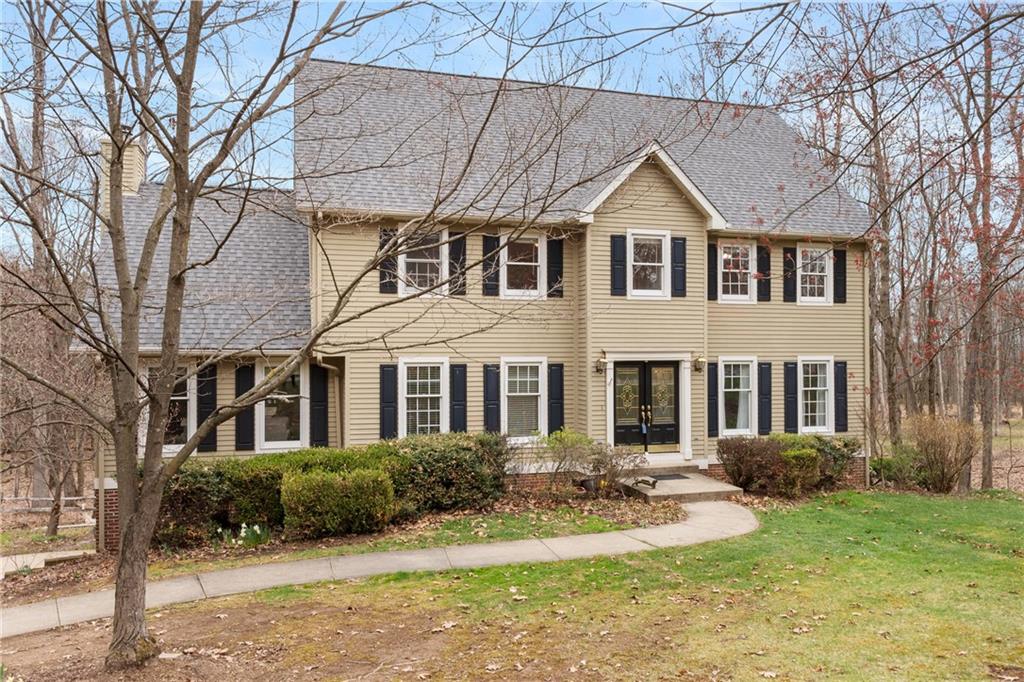 207 Oak Leaf Drive Mars, PA 16046 - Photo 35 of 40 a front view of a house with a yard