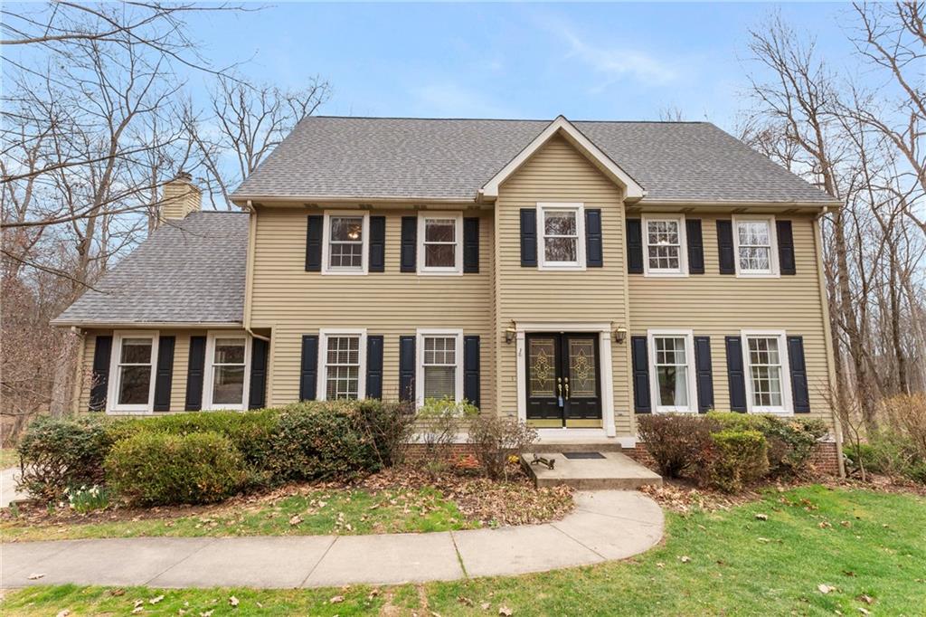 207 Oak Leaf Drive Mars, PA 16046 - Photo 7 of 40 a front view of a house with a yard