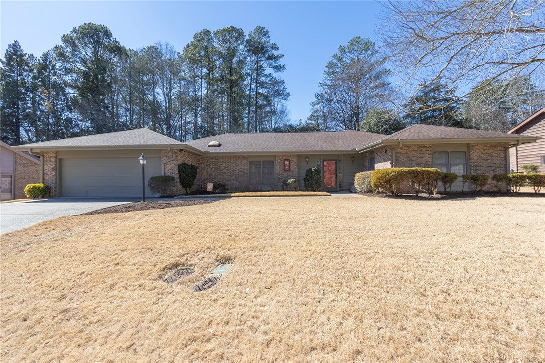 52 Hickory Way Clemson, SC 29631 - Photo 1 of 49 This charming residence features a classic brick exterior and an attached garage, perfect for comfortable living.