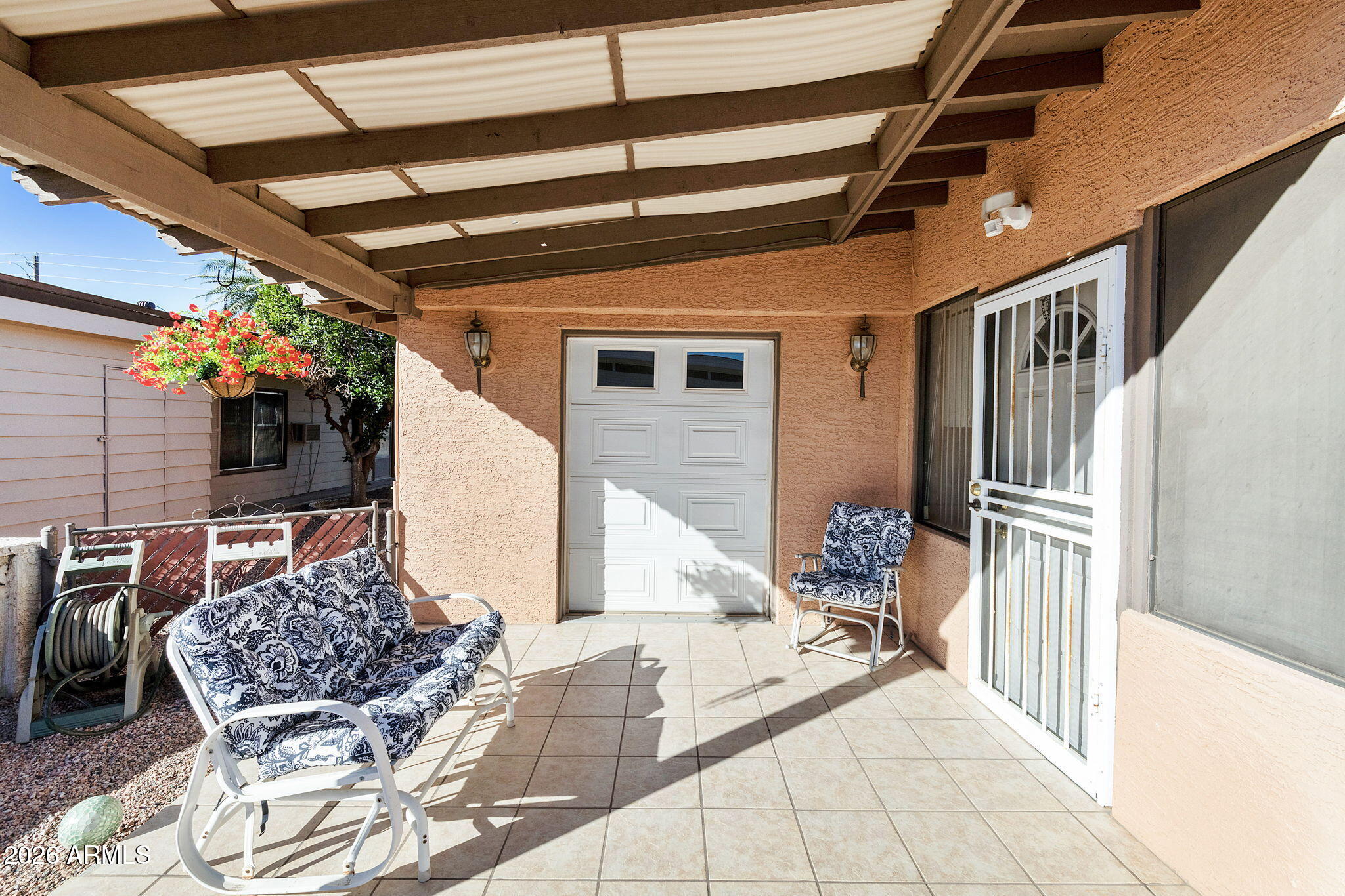 2435 North Higley Road Mesa, AZ 85215 - Photo 16 of 84 a outdoor space with seating