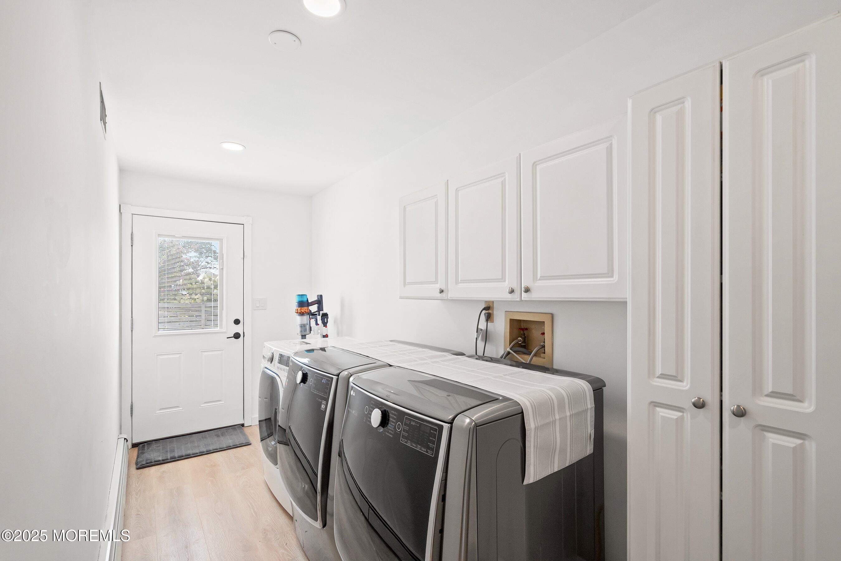 1615 Calamus Place Point Pleasant, NJ 08742 - Photo 12 of 62 a utility room with dryer and washer