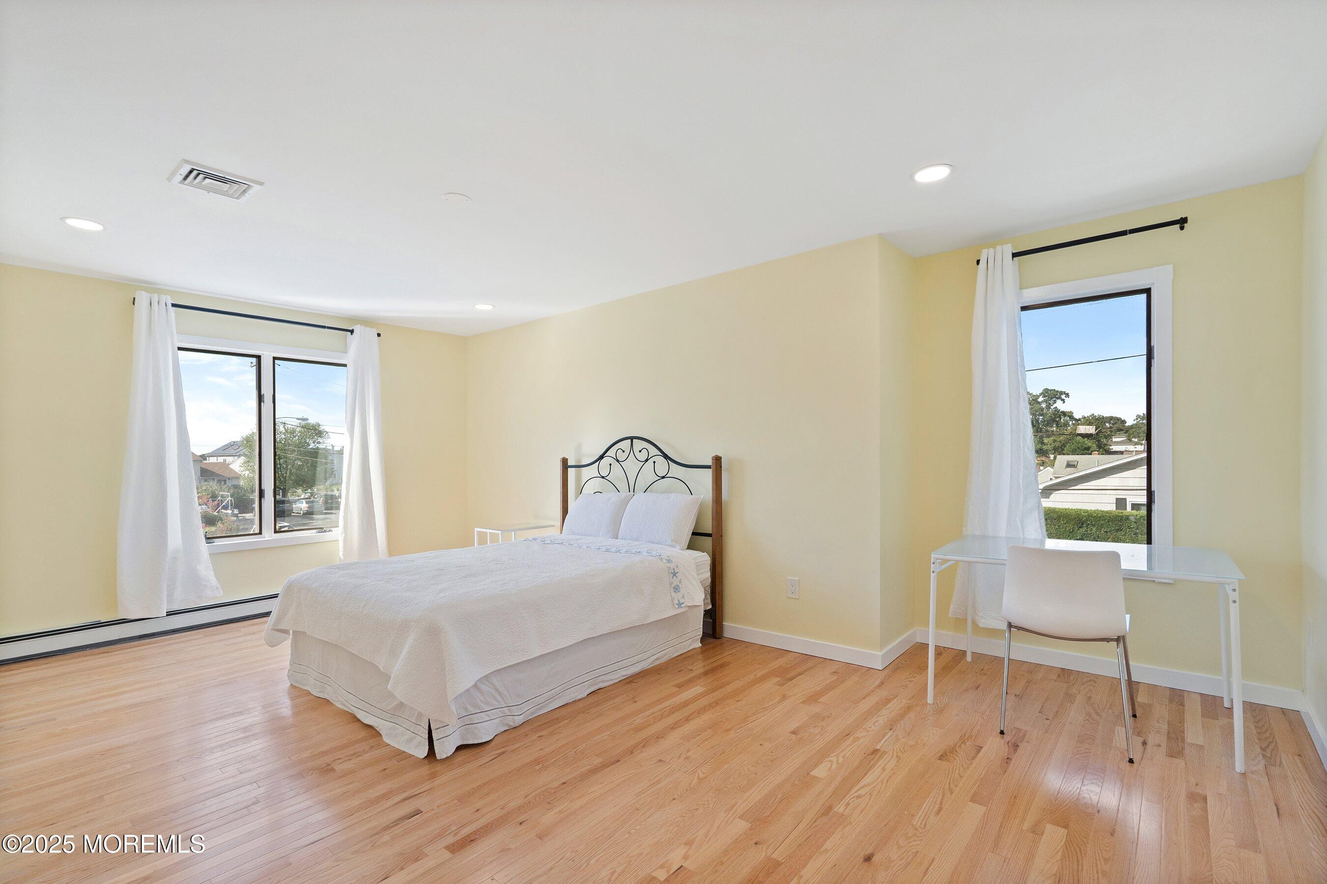 1615 Calamus Place Point Pleasant, NJ 08742 - Photo 26 of 62 a bedroom with a bed and a window