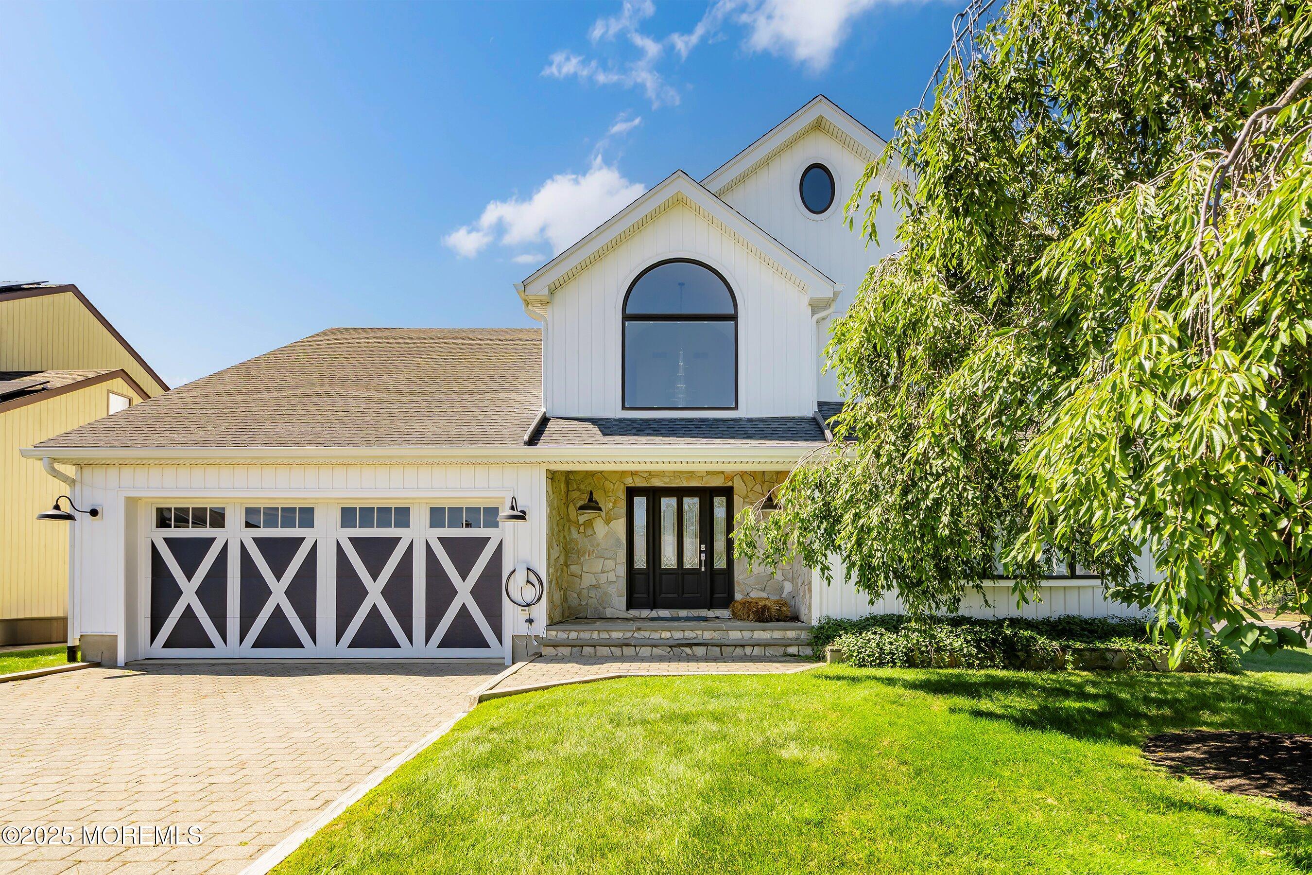1615 Calamus Place Point Pleasant, NJ 08742 - Photo 3 of 62 a front view of a house with garden
