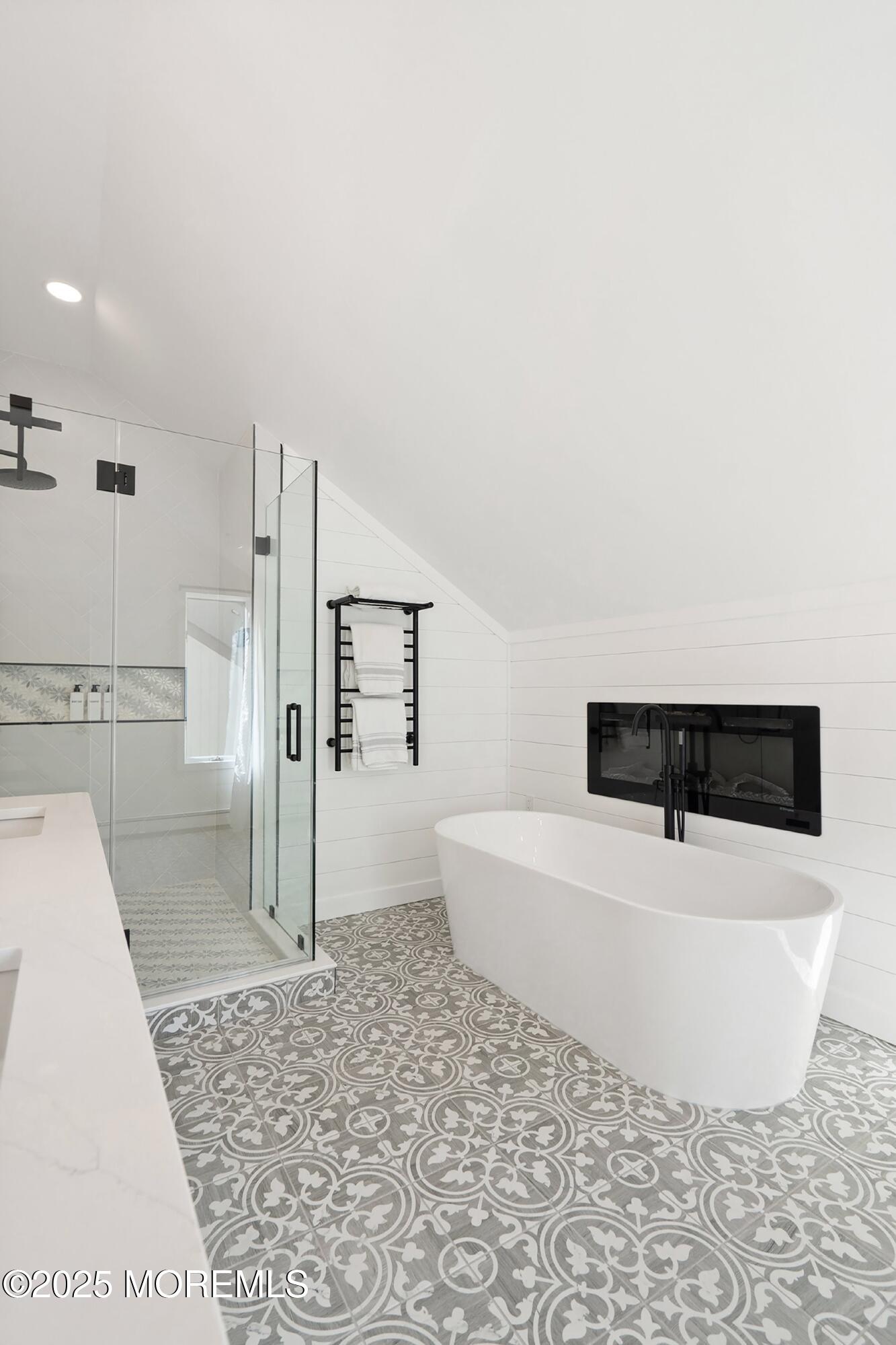 1615 Calamus Place Point Pleasant, NJ 08742 - Photo 32 of 62 a room with a rug and a fireplace