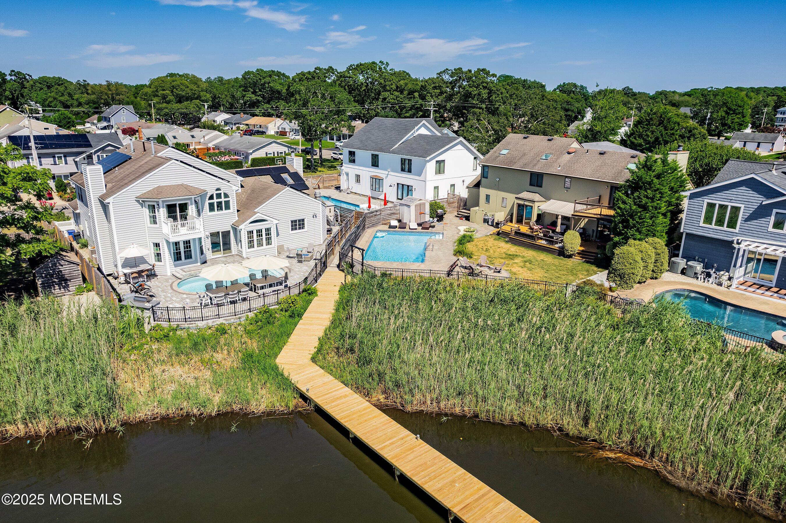 1615 Calamus Place Point Pleasant, NJ 08742 - Photo 39 of 62 an aerial view of a house with a garden