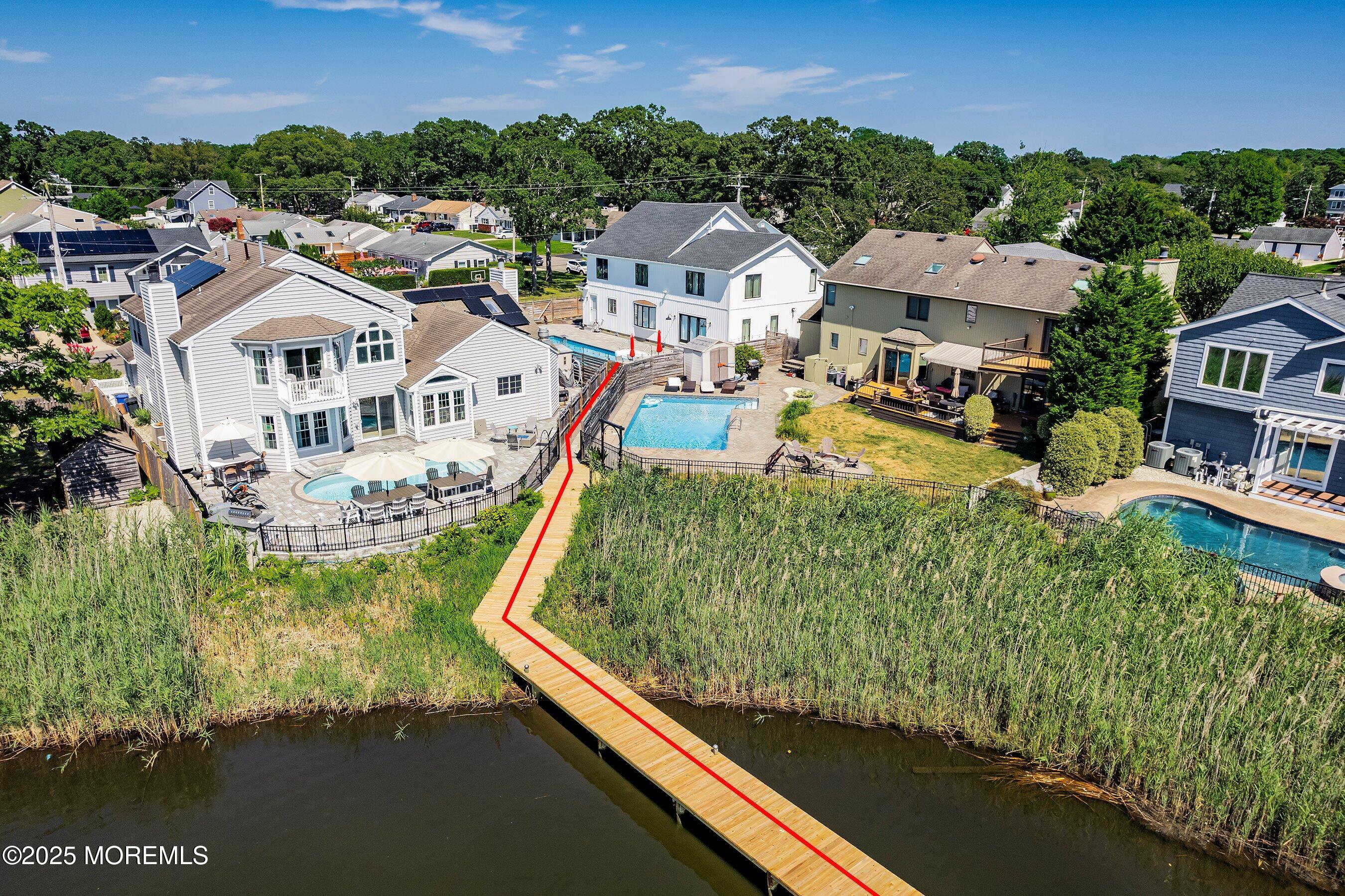 1615 Calamus Place Point Pleasant, NJ 08742 - Photo 40 of 62 an aerial view of residential houses with outdoor space and swimming pool