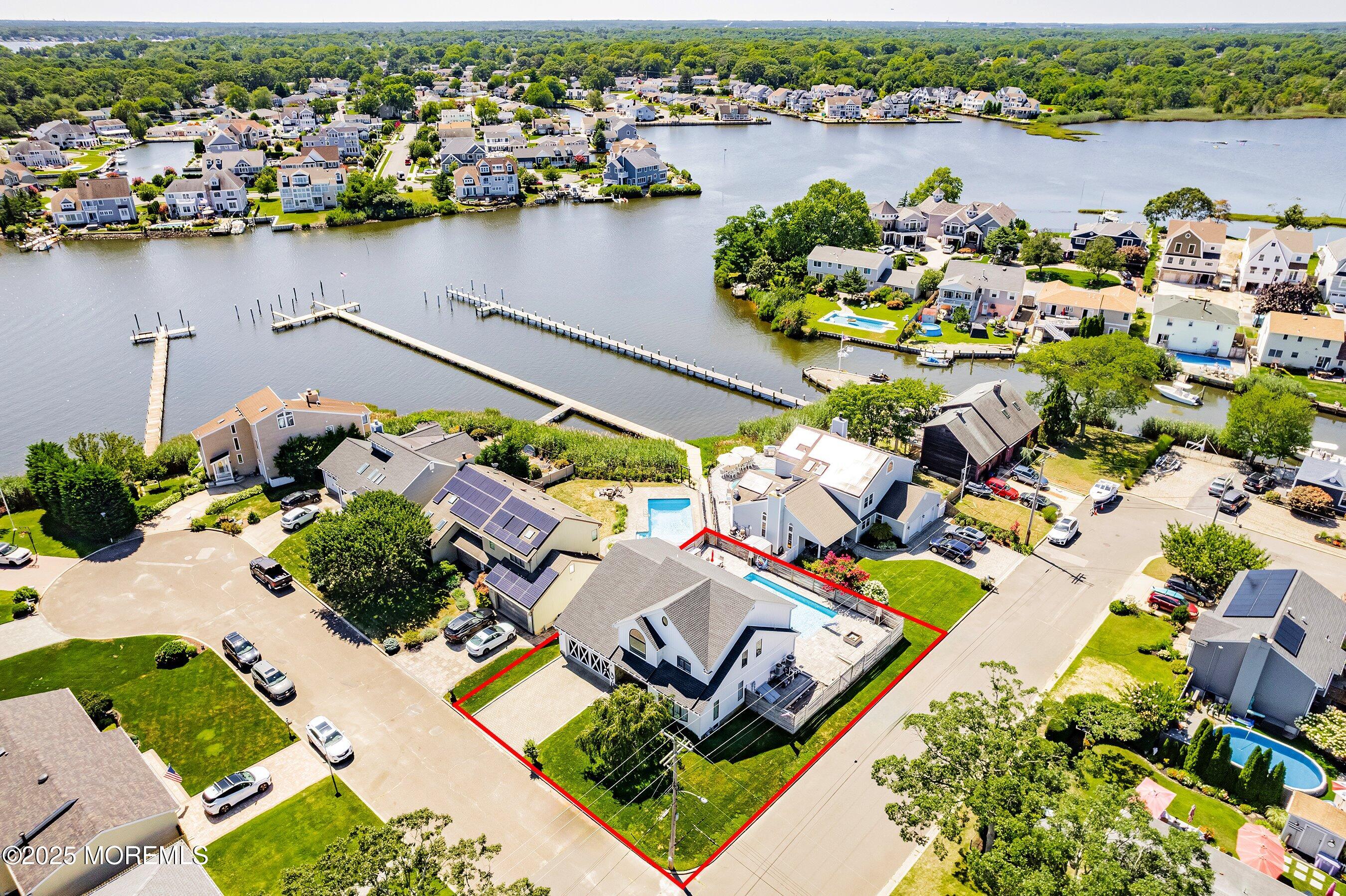 1615 Calamus Place Point Pleasant, NJ 08742 - Photo 4 of 62 an aerial view of a house with a lake view