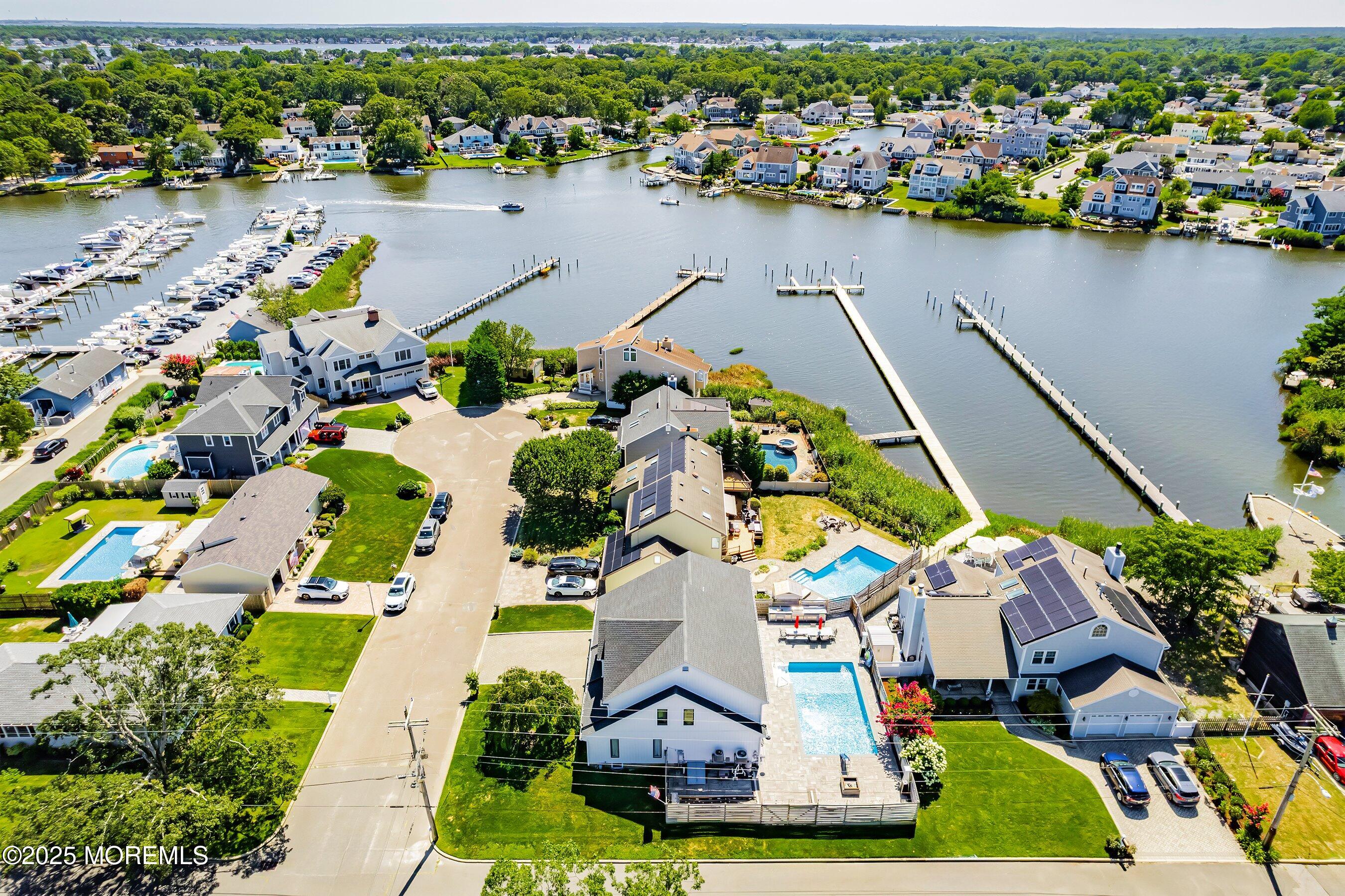 1615 Calamus Place Point Pleasant, NJ 08742 - Photo 47 of 62 an aerial view of residential houses with outdoor space and lake view