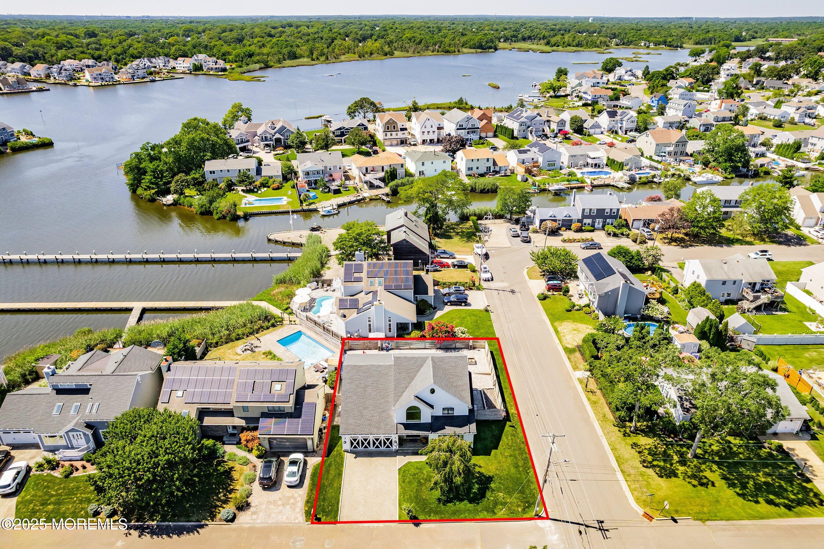 1615 Calamus Place Point Pleasant, NJ 08742 - Photo 6 of 62 an aerial view of a city with lake view