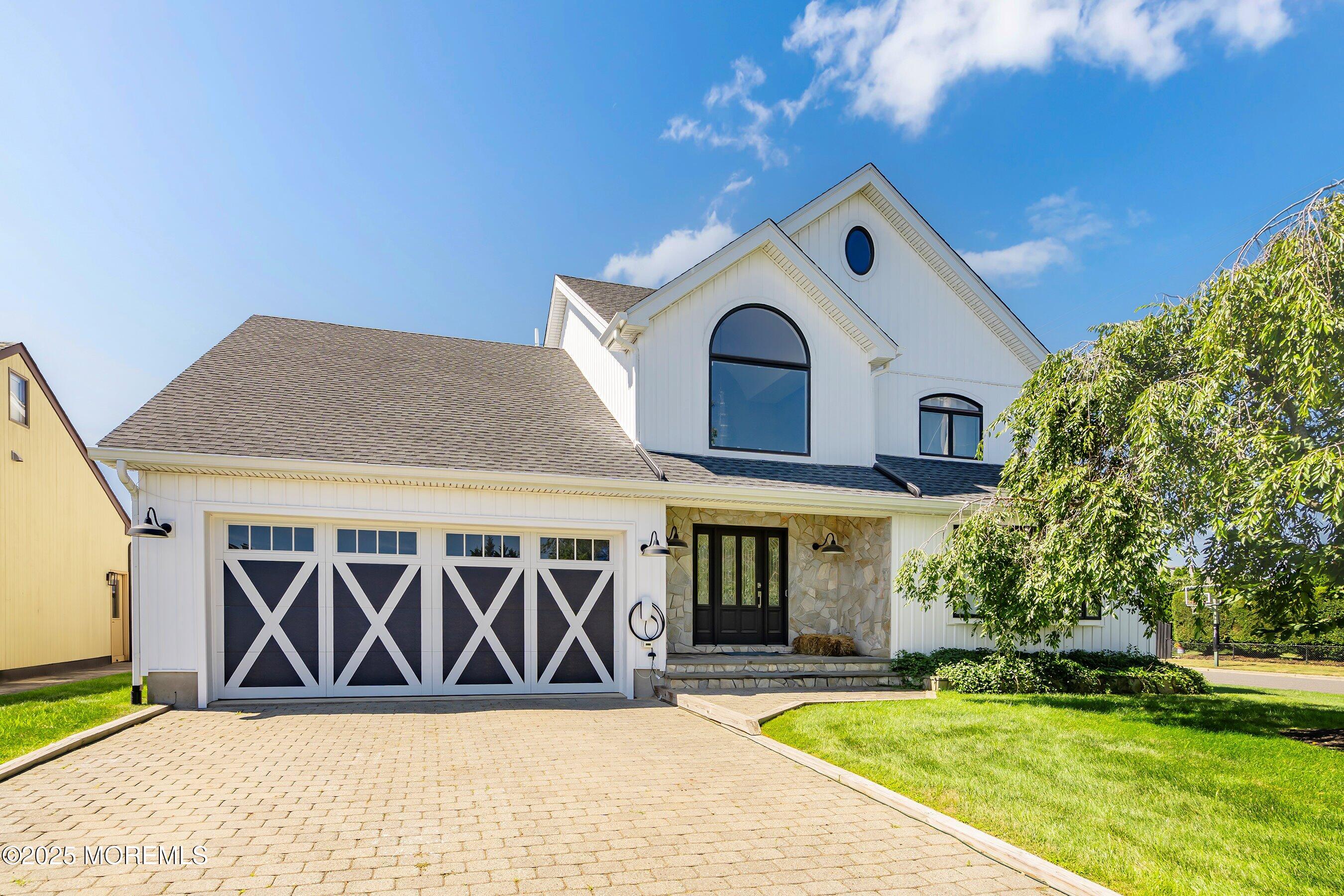 1615 Calamus Place Point Pleasant, NJ 08742 - Photo 7 of 62 a front view of a house with a yard