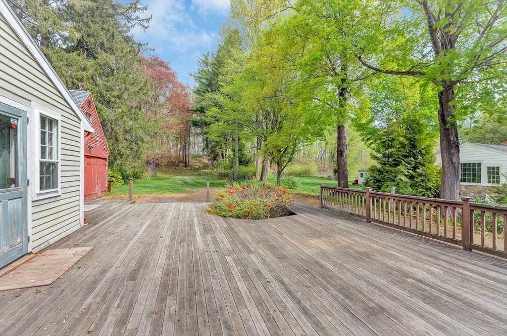 382 Main Street Amesbury, MA 01913 - Photo 4 of 42 a view of a backyard with wooden floor
