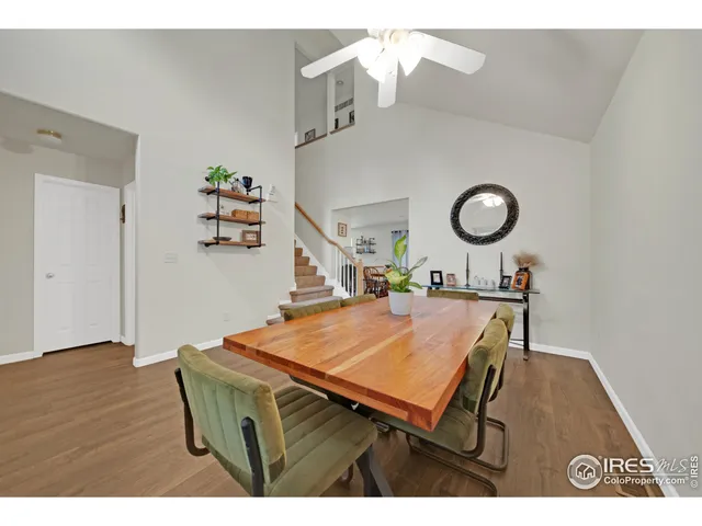 a room with furniture and wooden floor