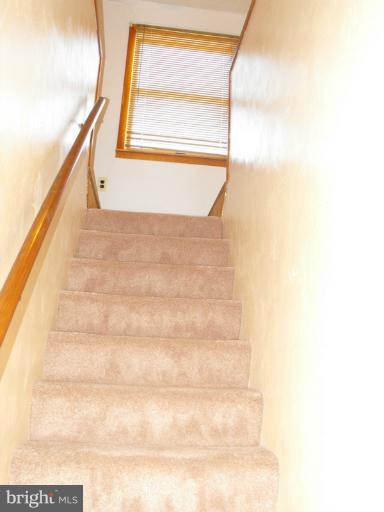 6605 Randolph Road Morningside, MD 20746 - Photo 2 of 30 Stairway to upper level
