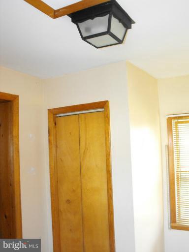 6605 Randolph Road Morningside, MD 20746 - Photo 18 of 30 Enclosed front porch w/closet