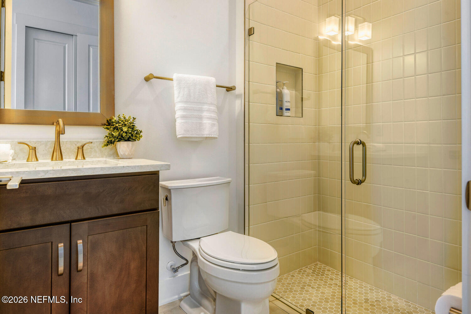 279 Bismarck Palm Road St. Augustine, FL 32092 - Photo 17 of 38 a bathroom with a sink toilet and shower