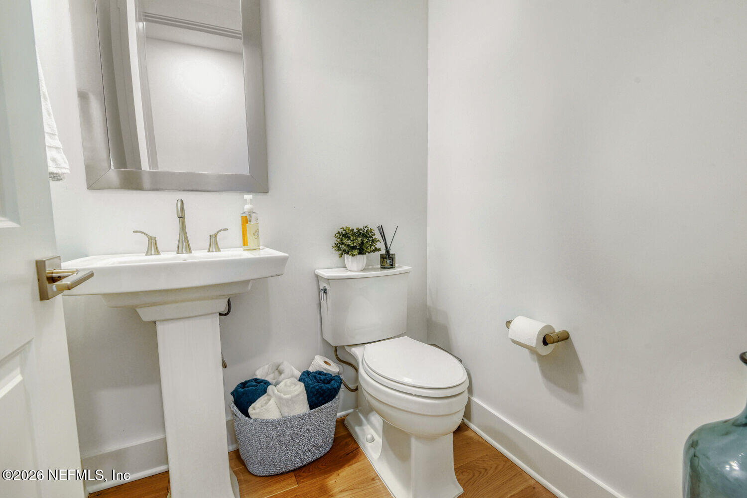 279 Bismarck Palm Road St. Augustine, FL 32092 - Photo 21 of 38 a bathroom with a sink toilet and mirror