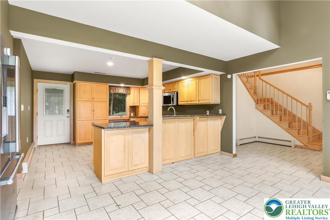 376 H T Y Road Kunkletown, PA 18058 - Photo 37 of 80 a view of a hallway with kitchen and entryway