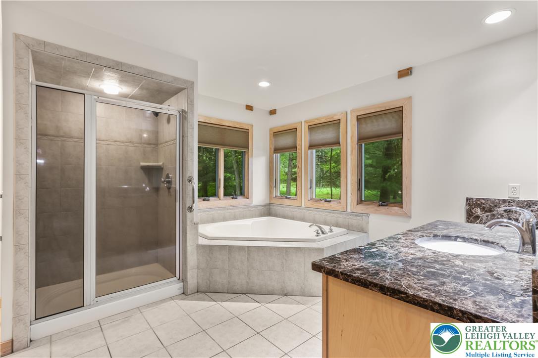 376 H T Y Road Kunkletown, PA 18058 - Photo 54 of 80 a bath tub sitting next to a tub and shower